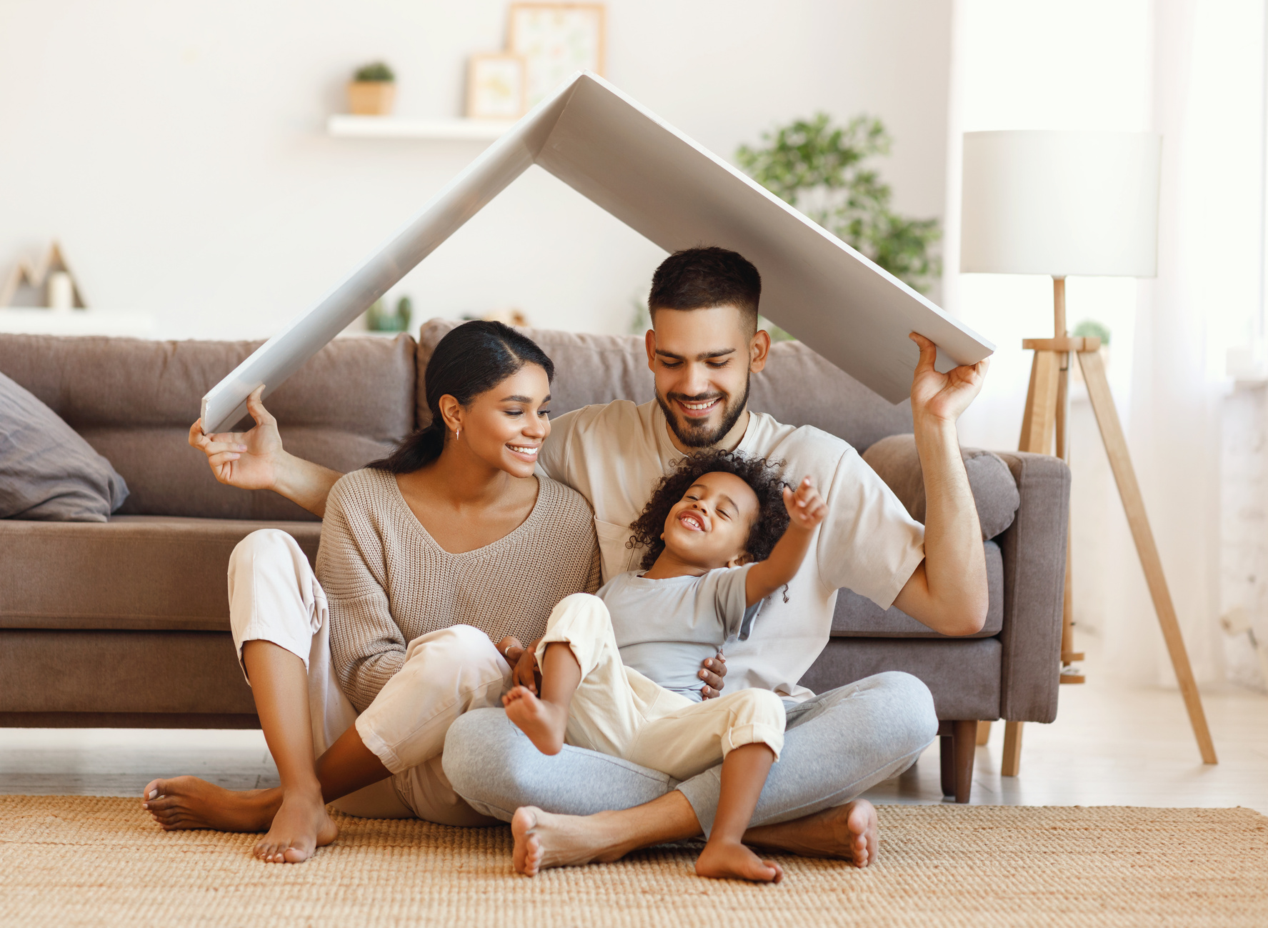 Happy multiethnic family under roof